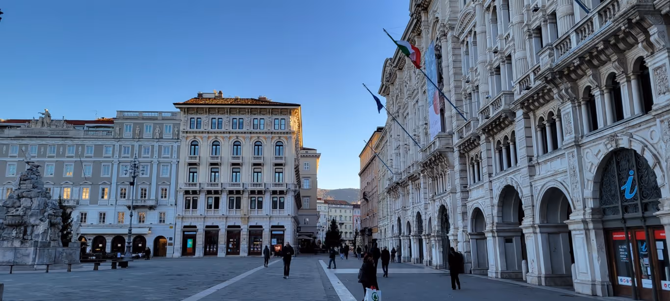 The main piazza in Trieste on a cold winter day while the buildings are in the shade. 
