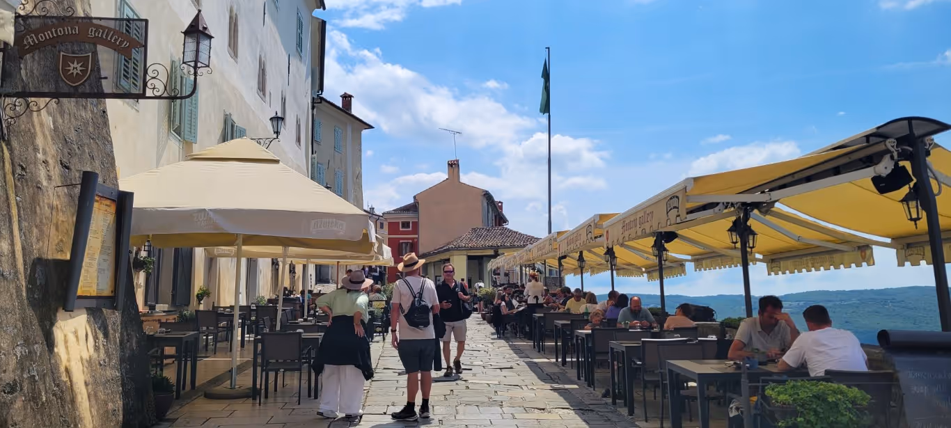 An old castle over the hills that has been renovated for an outdoor restaurants.