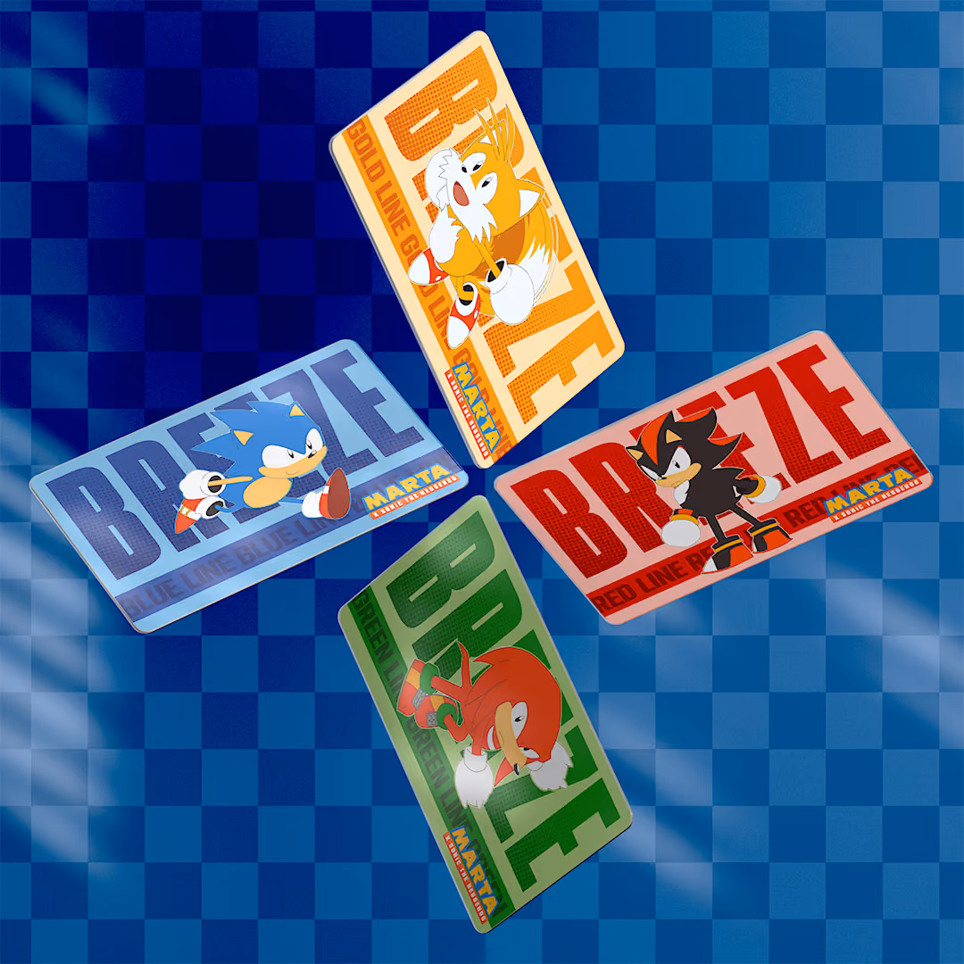 Four colorful cards featuring Sonic the Hedgehog characters on a blue checkered background.