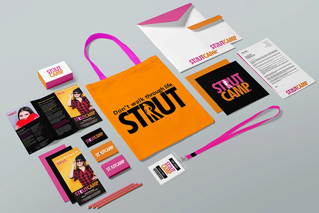 StrutCamp brand identity system across tote bag, print and stationery