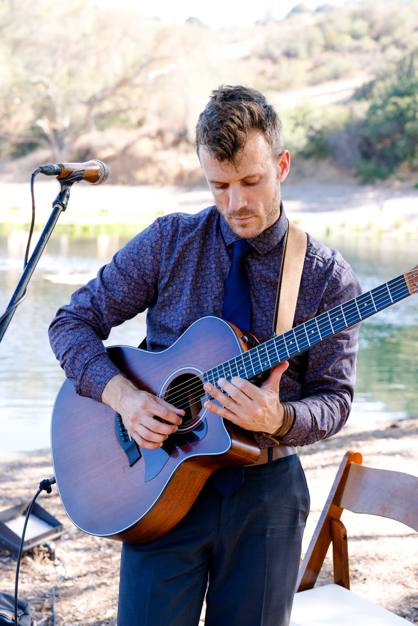 Dylan Galvin performing solo acoustic guitar at a wedding ceremony at Monserate Winery in Fallbrook, California.