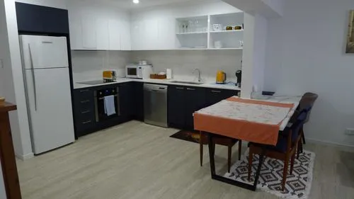 fully featured kitchen including fridge, microwave, oven, cooking utilities and much more