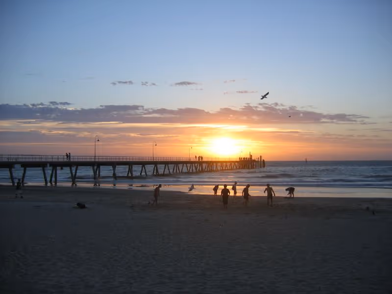 Sunset over Glenelg Beach. Credit: Bram Souffreau, Wikimedia Commons: https://commons.wikimedia.org/wiki/File:Glenelg_sunset.jpg
