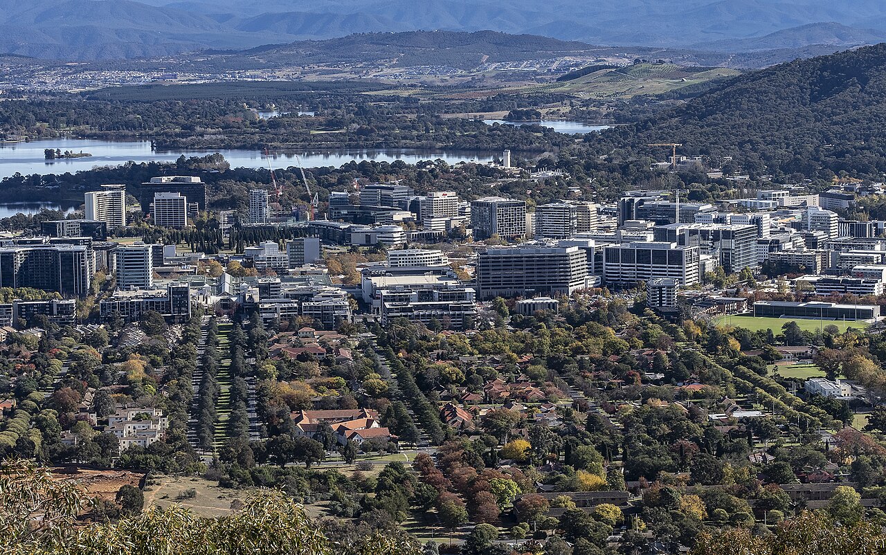 Canberra Civic Centre with modern architecture and surrounding public space, photographed in daylight. Credit: John, Wikimedia Commons: https://commons.wikimedia.org/wiki/File:Canberra_Civic_Centre-1.jpg