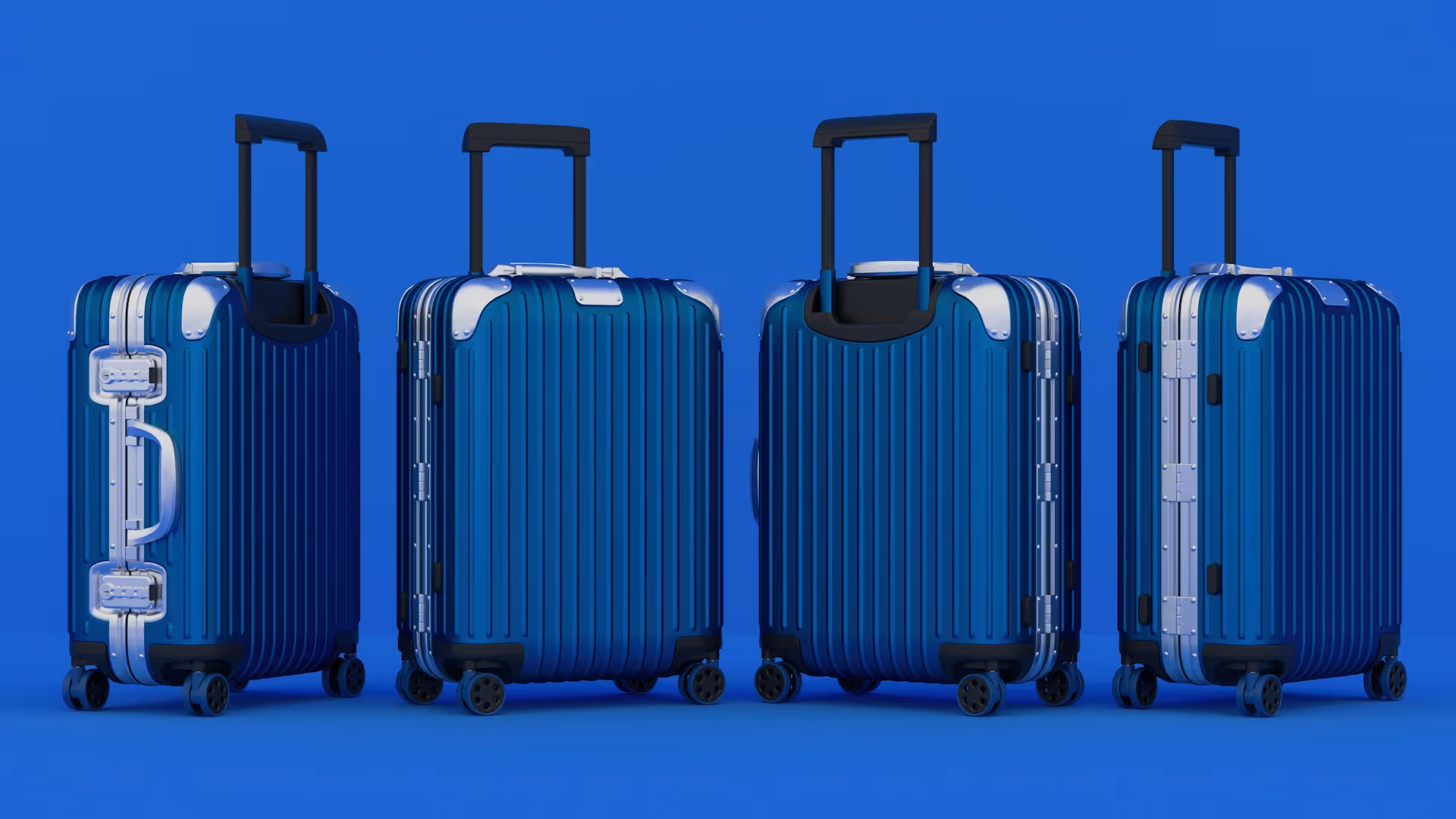 A set of four blue hard-shell suitcases