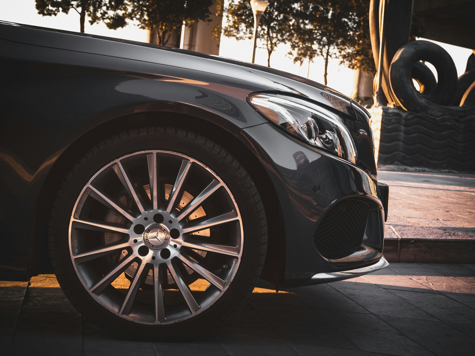 Close-up of a luxury black Mercedes-Benz wheel.