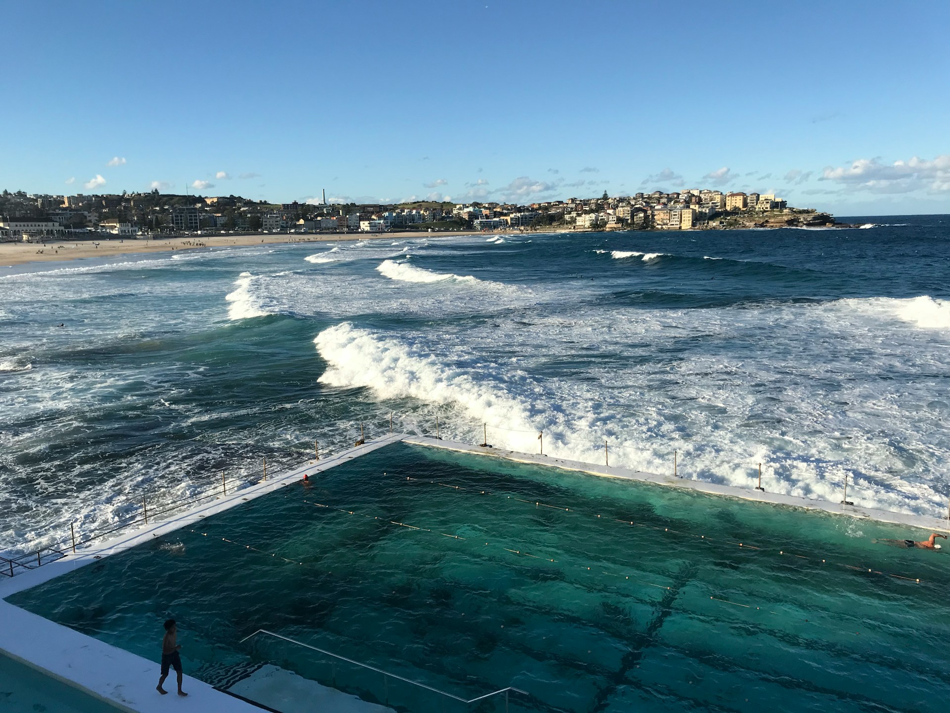 Bondi Icebergs pool with ocean waves and Bondi Beach coastline in Sydney.