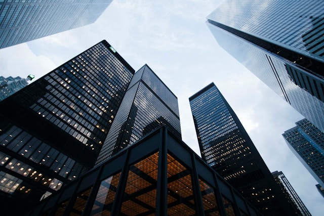 Low-angle view of modern office towers.