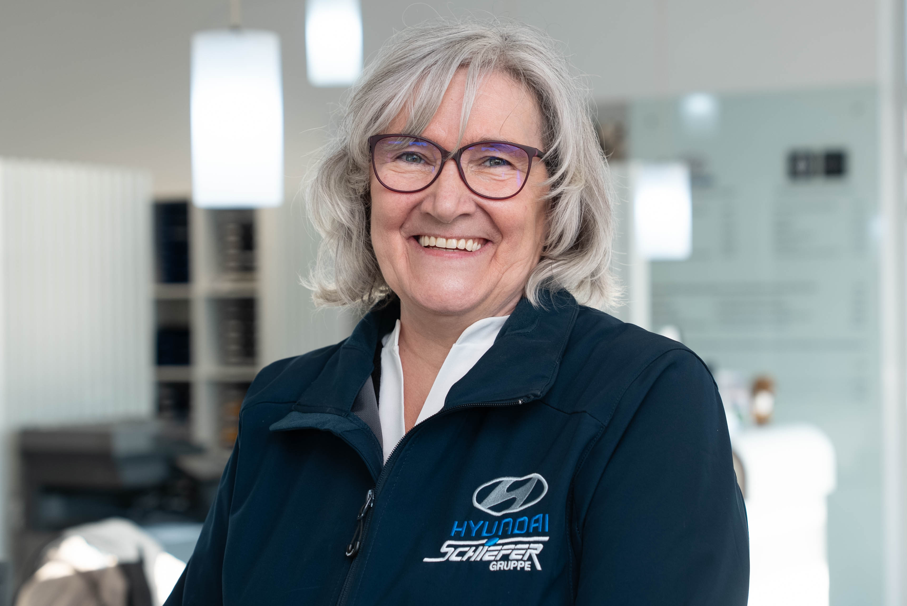 Abbildung zeigt Ansprechpartner für den Kundenempfang.