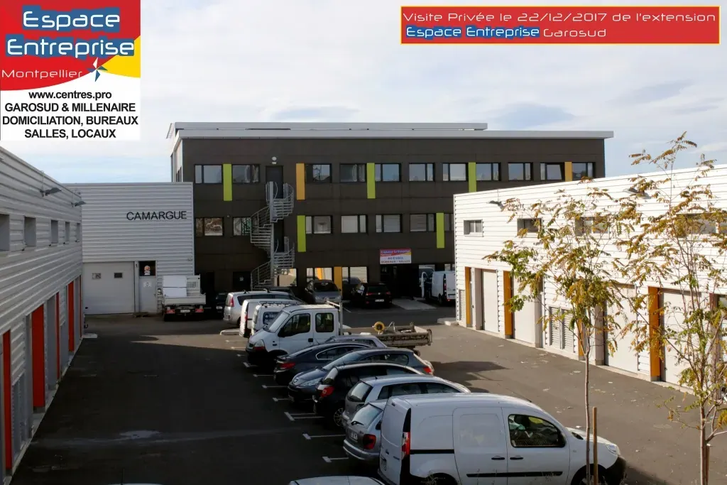 Visite privée de l'extension Espace Entreprise Garosud novembre 2018 à Montpellier : vue extérieure de l'extension Garosud avec parking et bâtiments