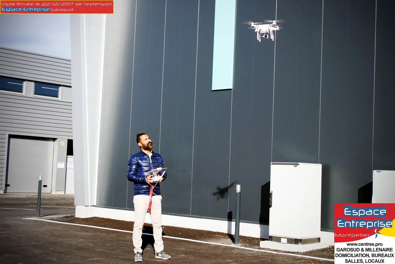 Visite privée de l'extension Espace Entreprise Garosud novembre 2018 à Montpellier : pilote de drone devant la façade des nouveaux bâtiments