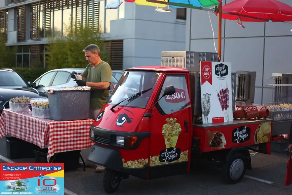 10 ans du centre Espace Entreprise Millénaire à Castelnau-le-Lez en 2018 : triporteur de restauration ambulante installé sur le parking