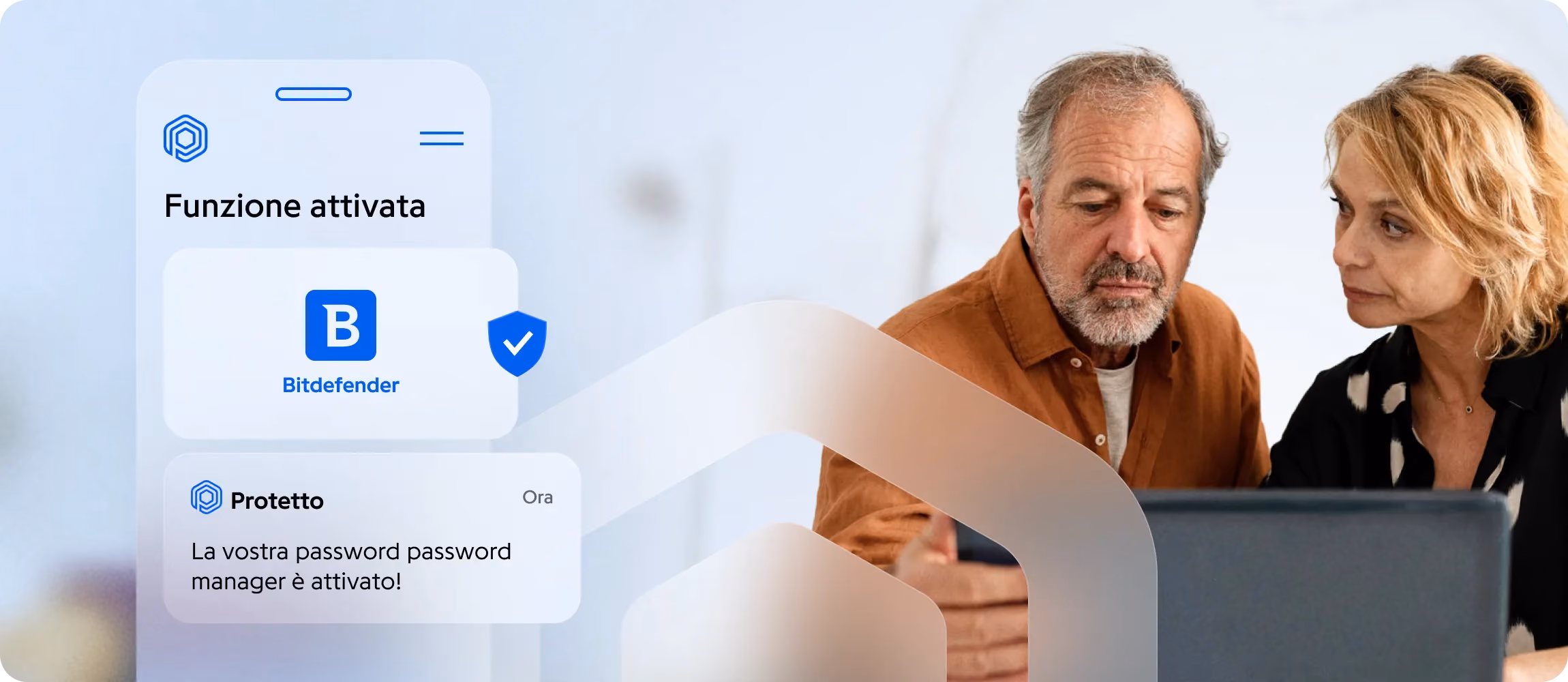 Coppia senior davanti a un portatile, gestore di password attivato