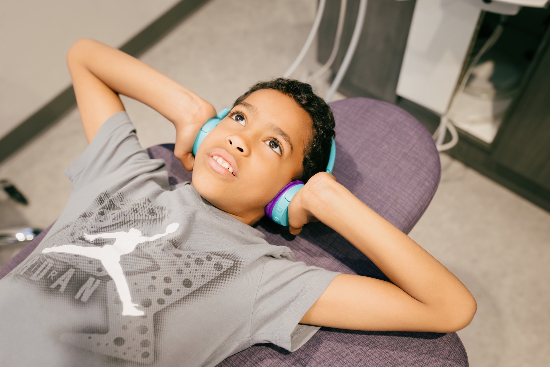 Child at Expedition Pediatric Dentistry laying down in dental office