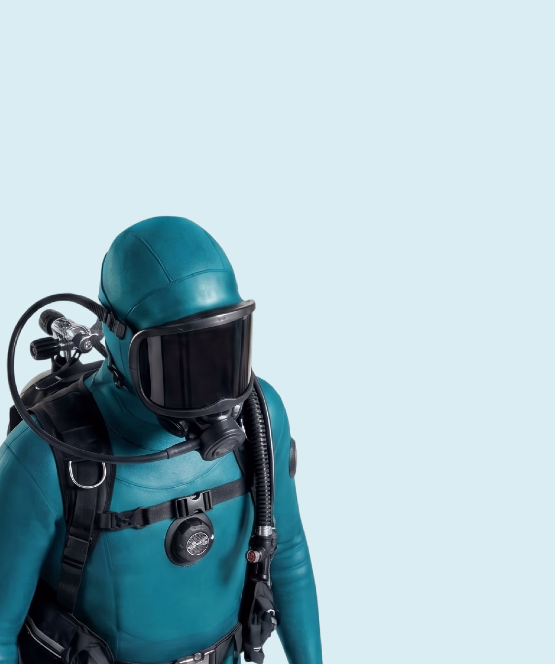Content writer, dressed as a scuba diver in a teal wetsuit.