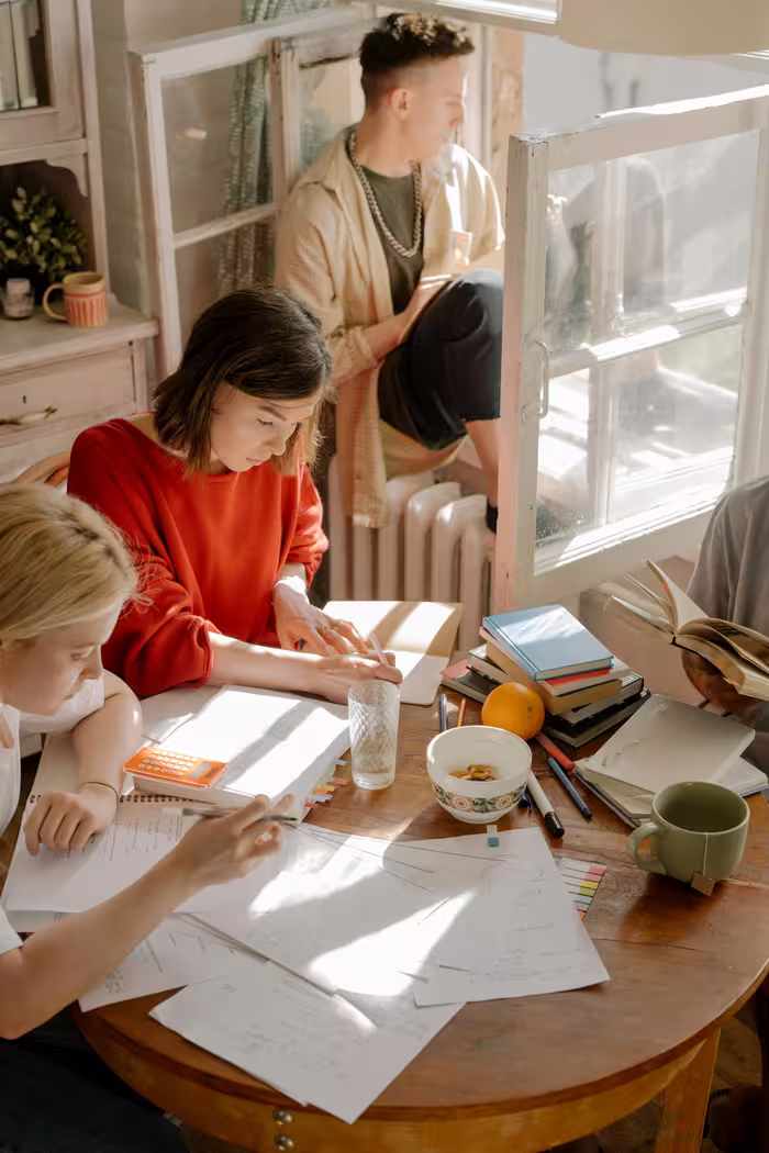 English language student learning together after school