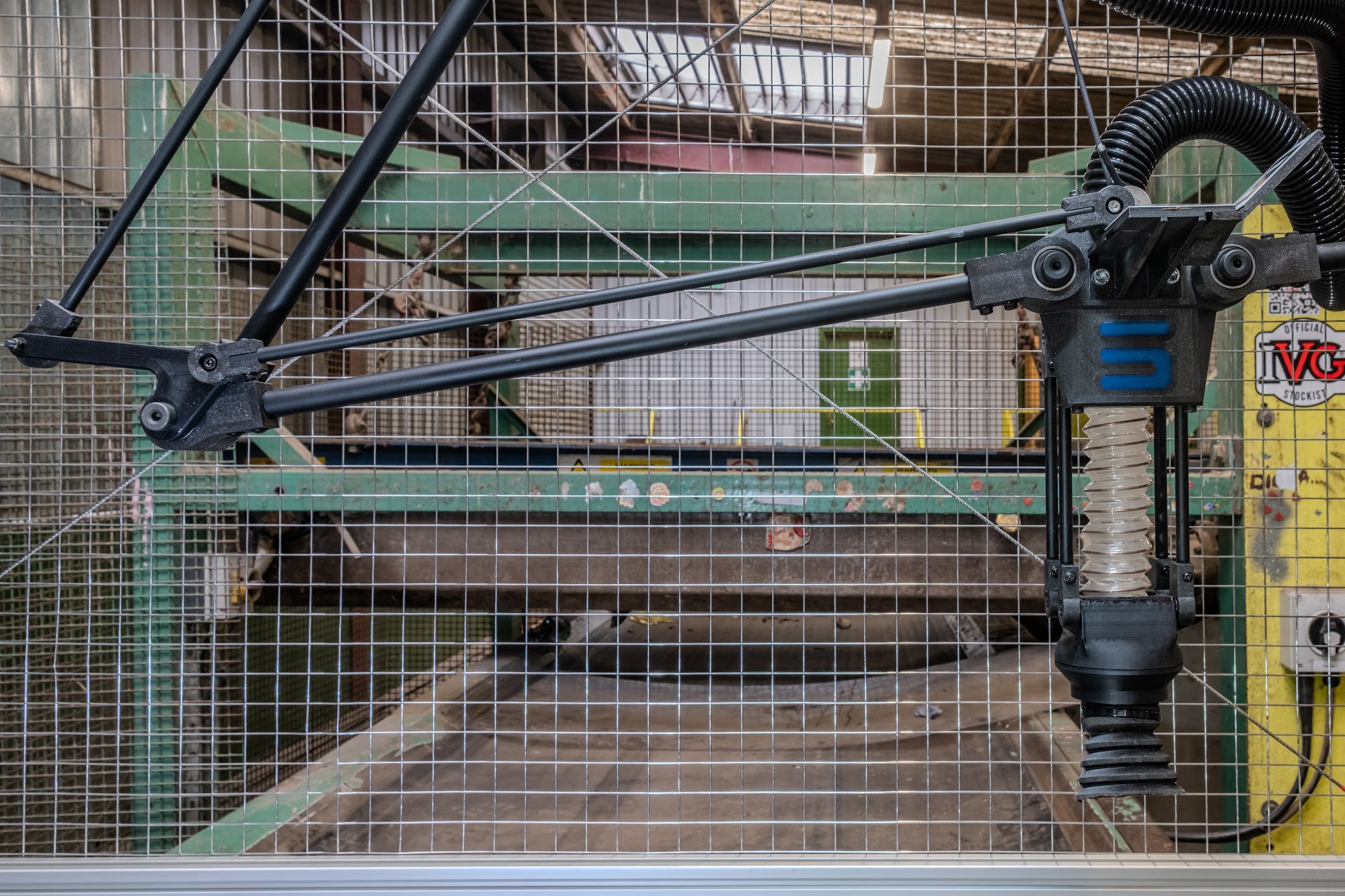 One of the SortBot's two picking arms with its suction cup