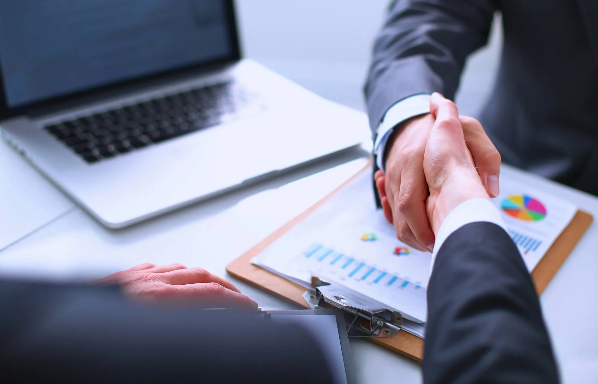 shaking hands after Selling My Software Business 