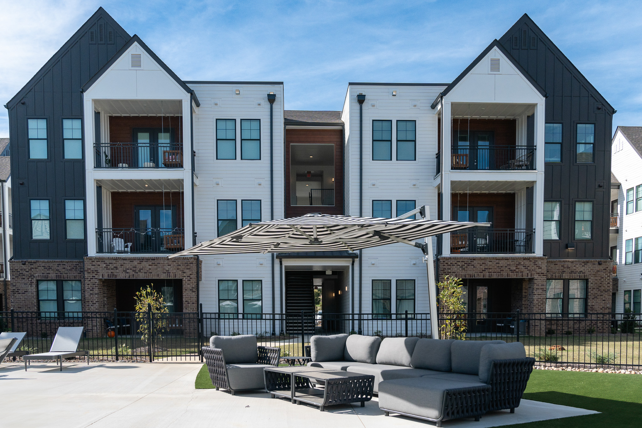 exterior seating area with umbrella