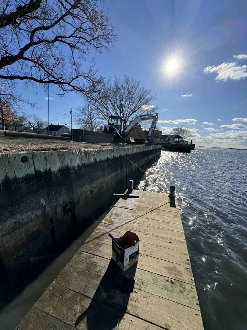 eroded beach with water approaching dunes - Beach erosion Long Island