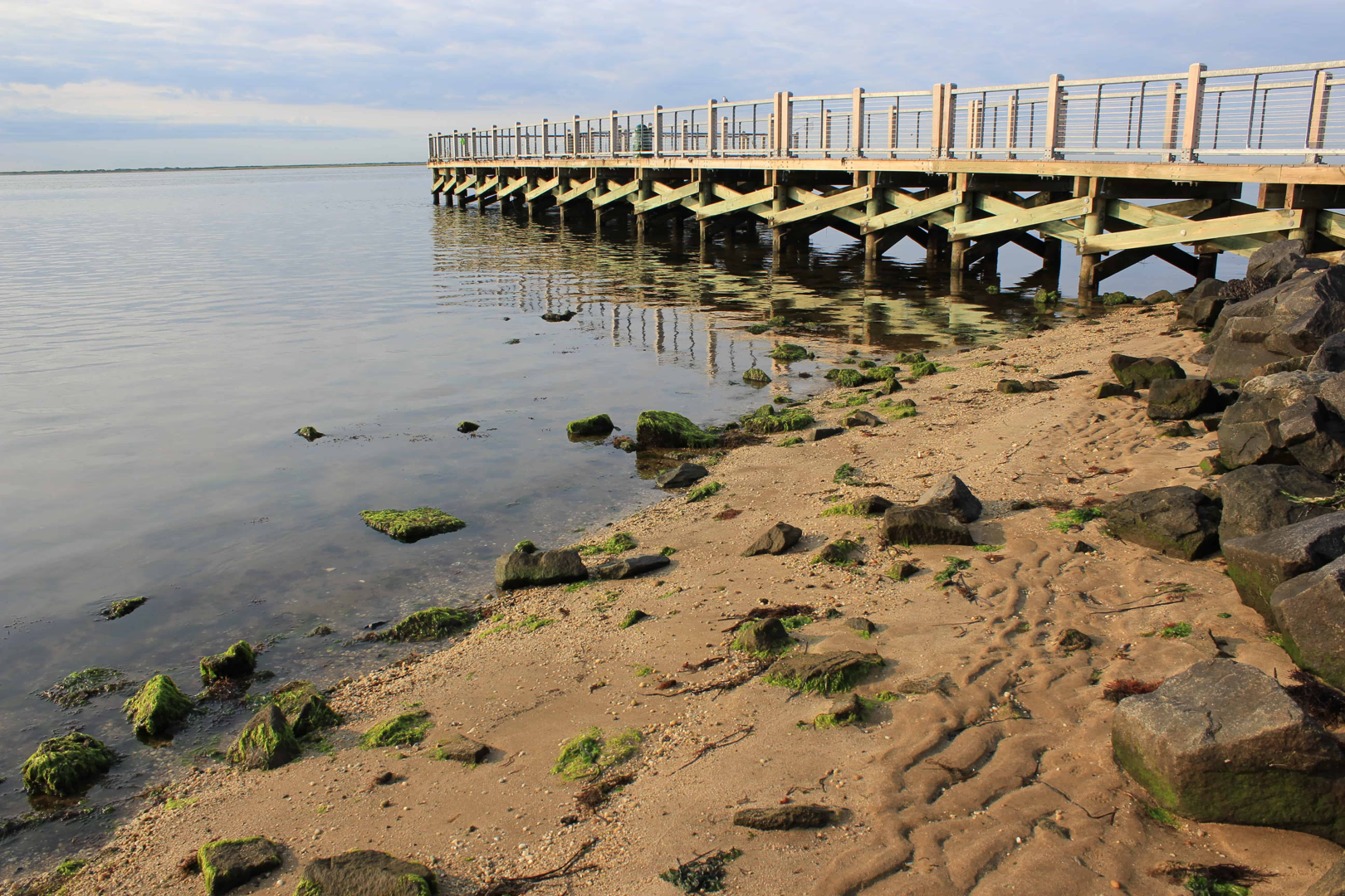 Shoreline in Suffolk County highlighting sandy, erosion-prone soil - Helical piles Long Island