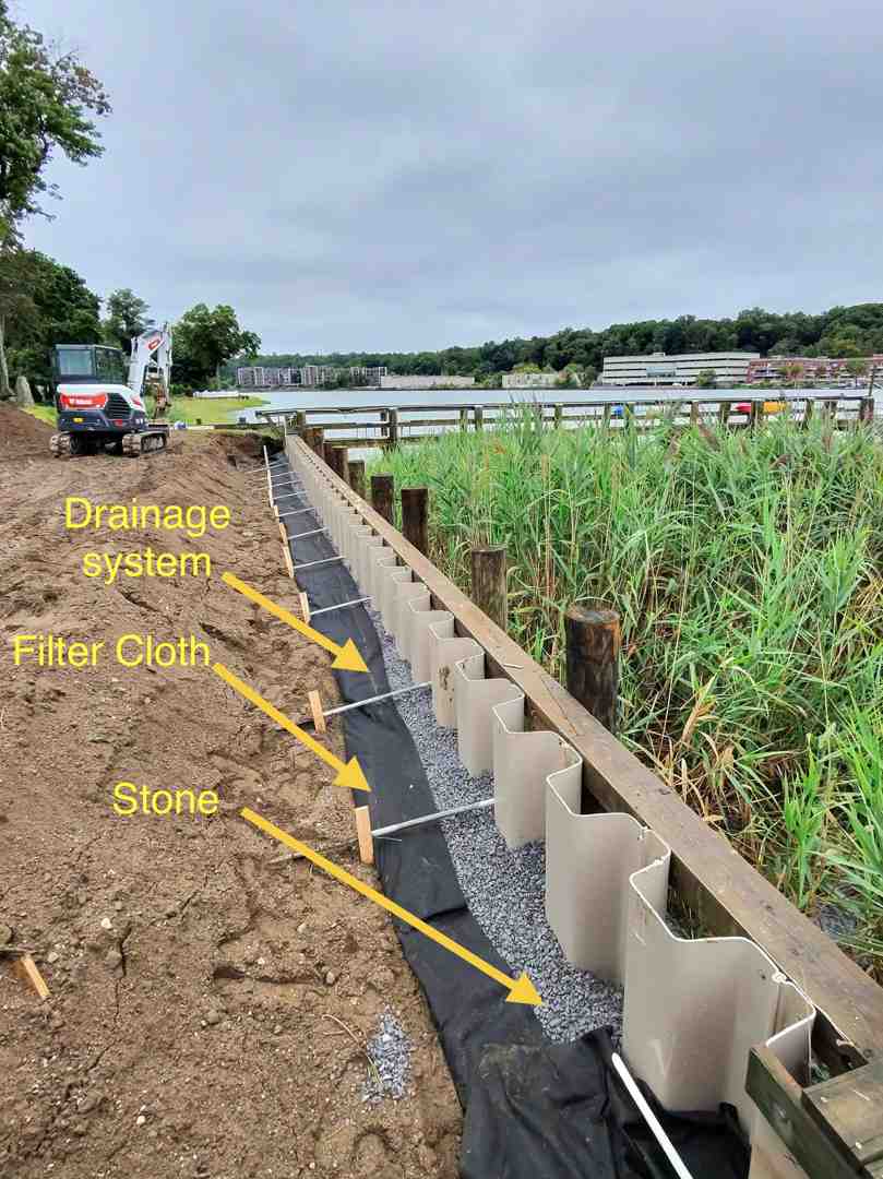 professionally installed living shoreline with a rock sill on a Long Island bay - coastal erosion prevention