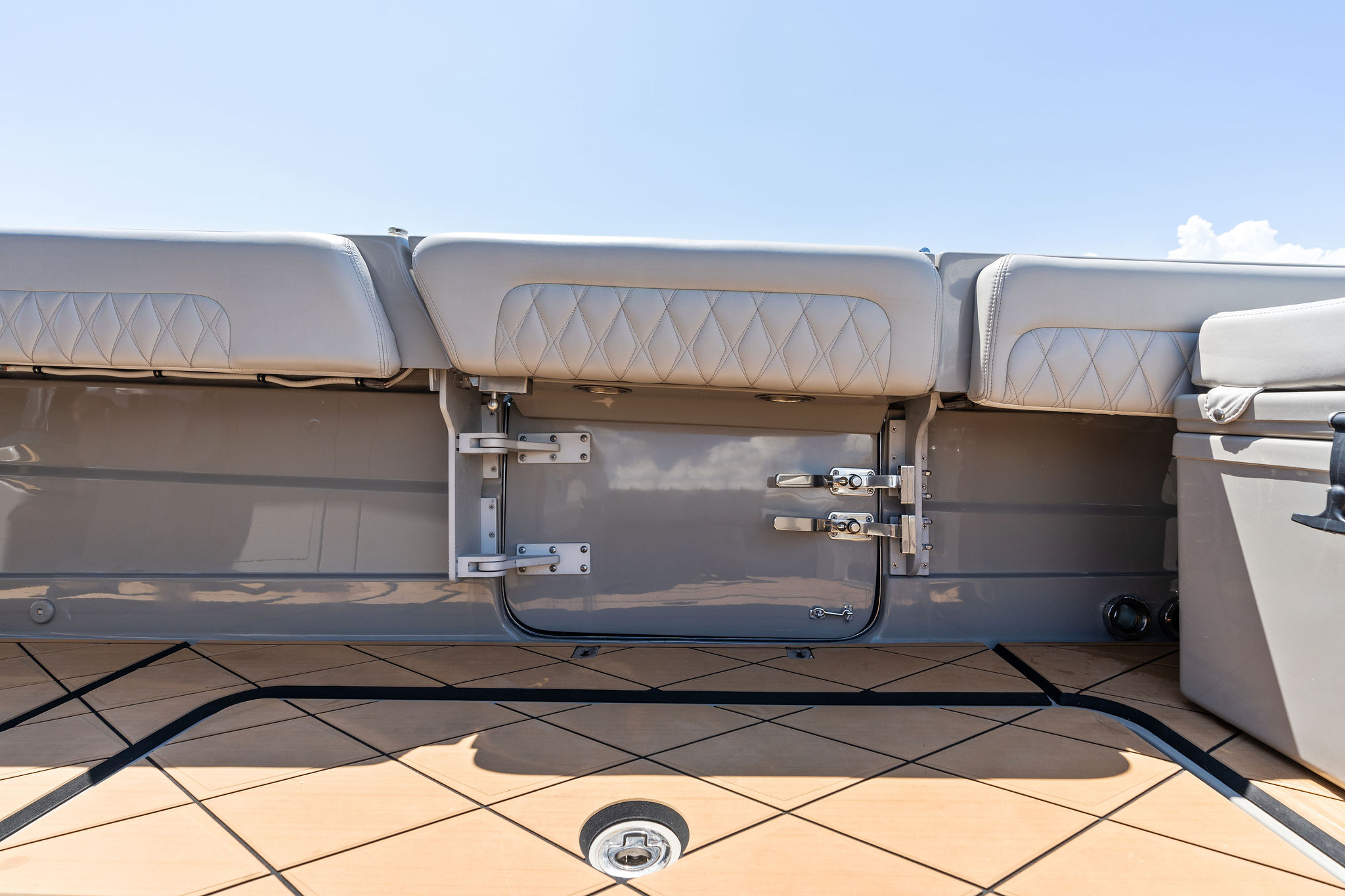 2023 HCB 42 Lujo boat interior with cushioned seating and sleek design.