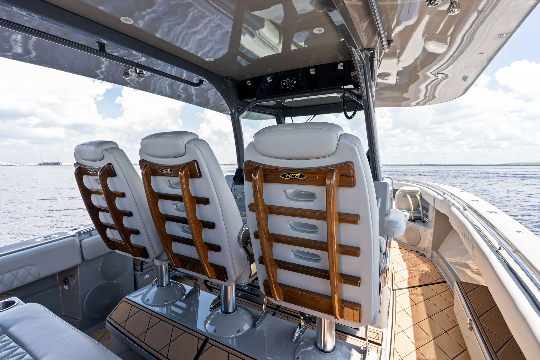 2023 HCB 42 Lujo boat interior with luxurious seating and ocean view.
