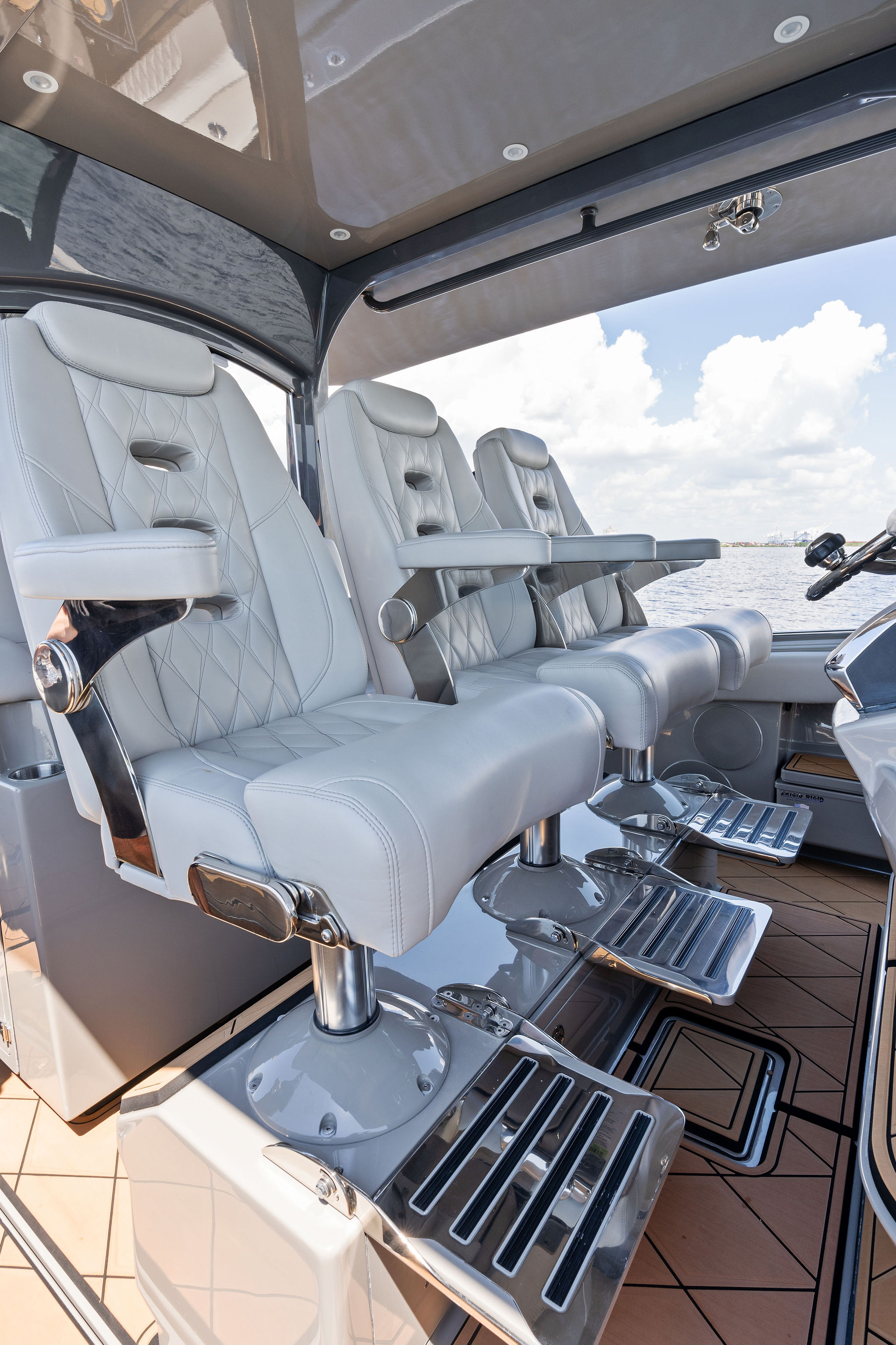Luxurious seating on 2023 HCB 42 Lujo boat, featuring sleek design and premium materials.