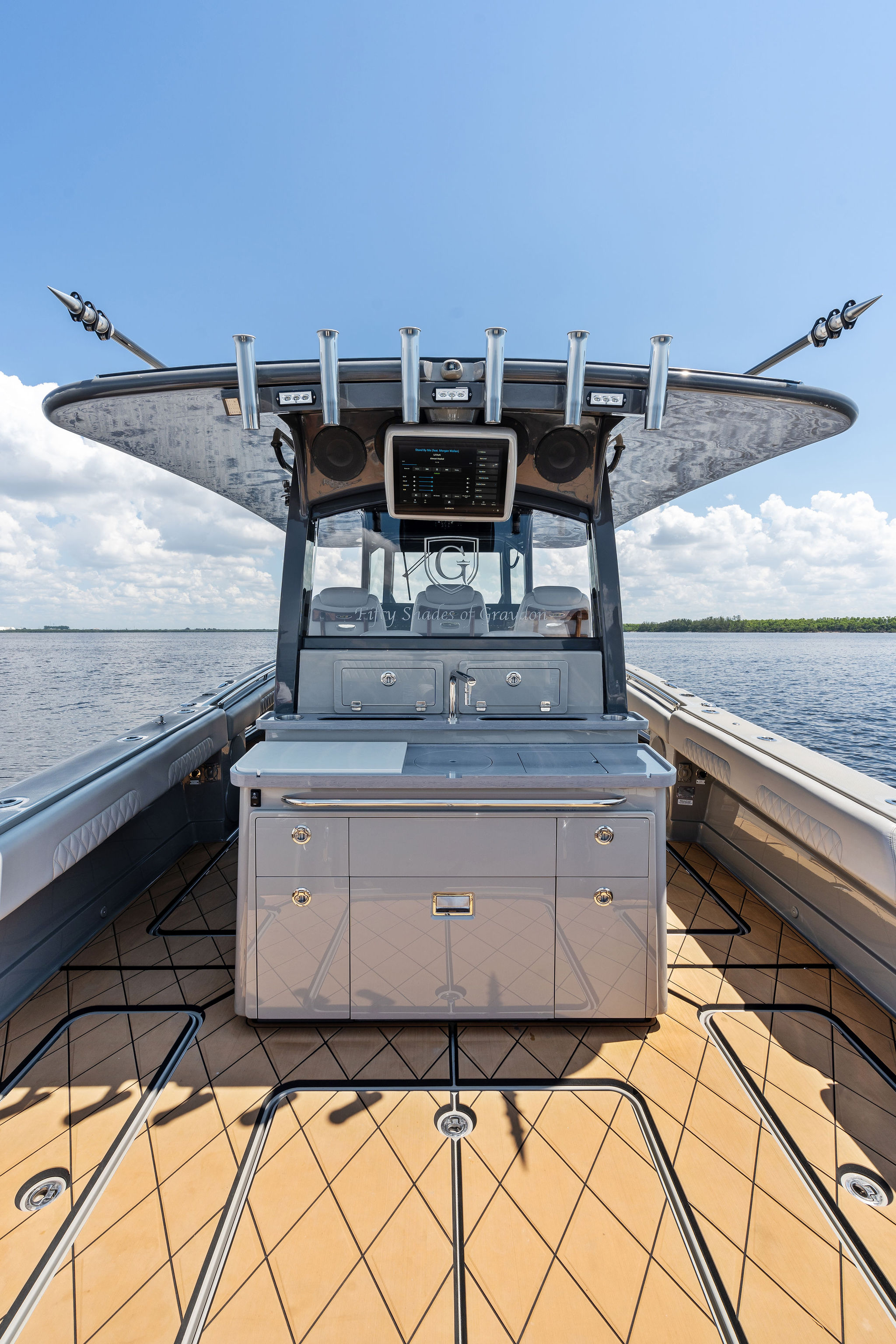 2023 HCB 42 Lujo boat interior with sleek design and modern amenities on open water.