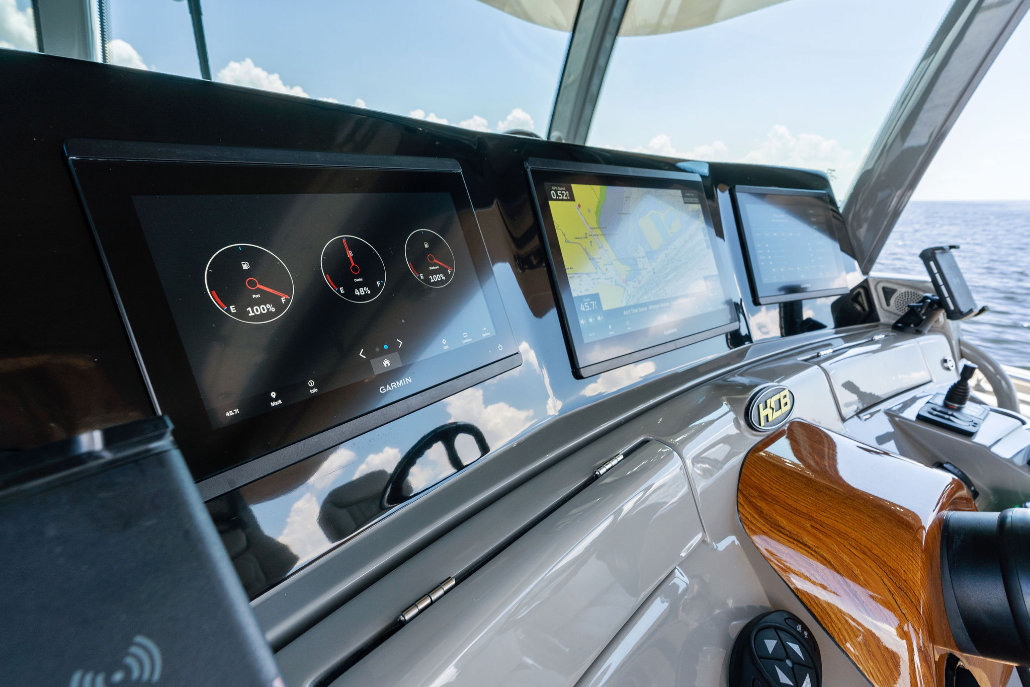 Helm of 2023 HCB 42 Lujo boat with advanced navigation displays.