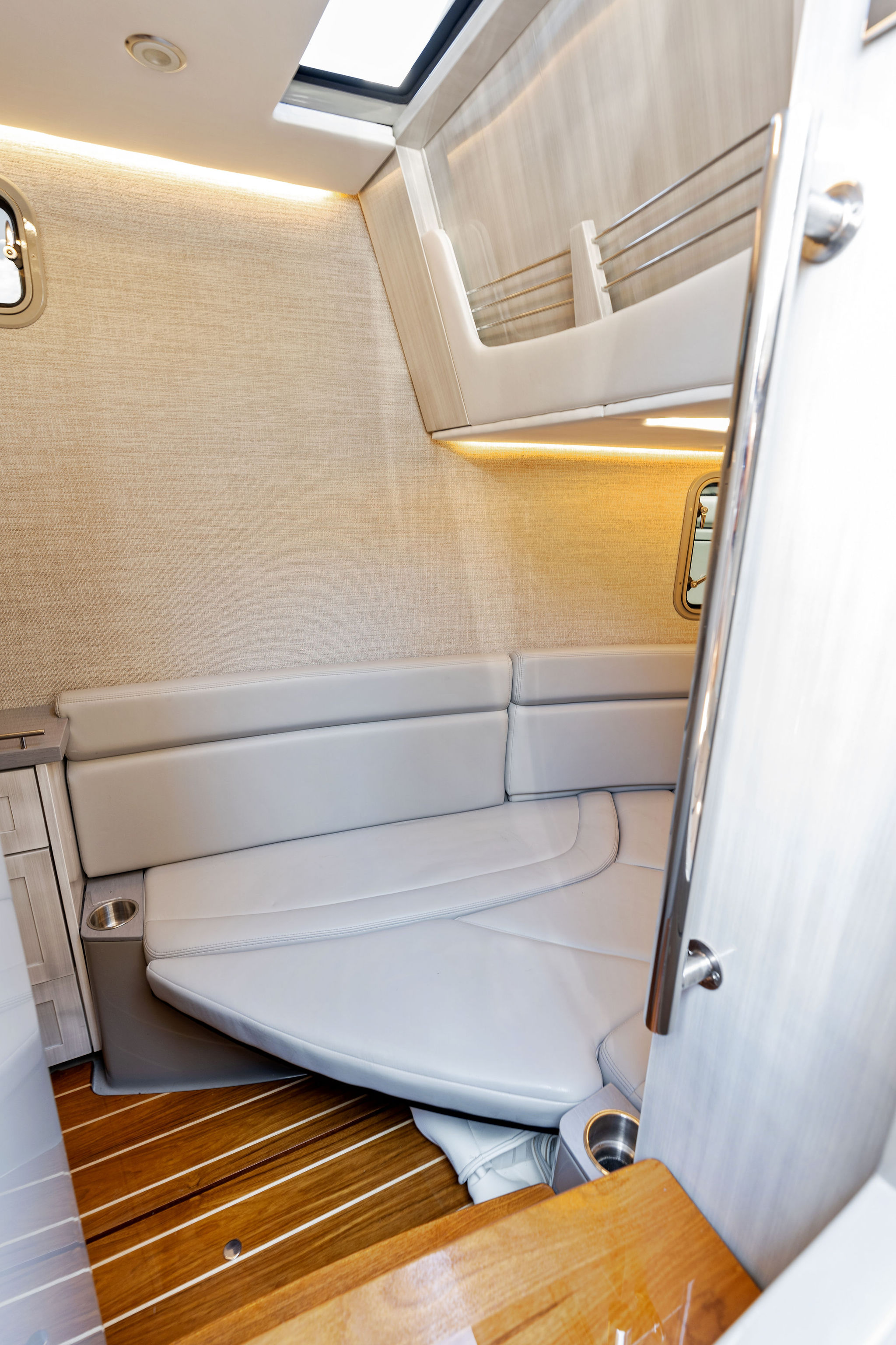 2023 HCB 42 Lujo cabin interior with sleek seating and modern design.
