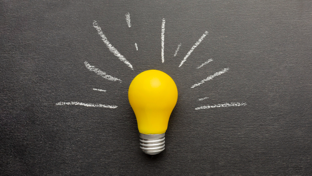 A light bulb with a black background