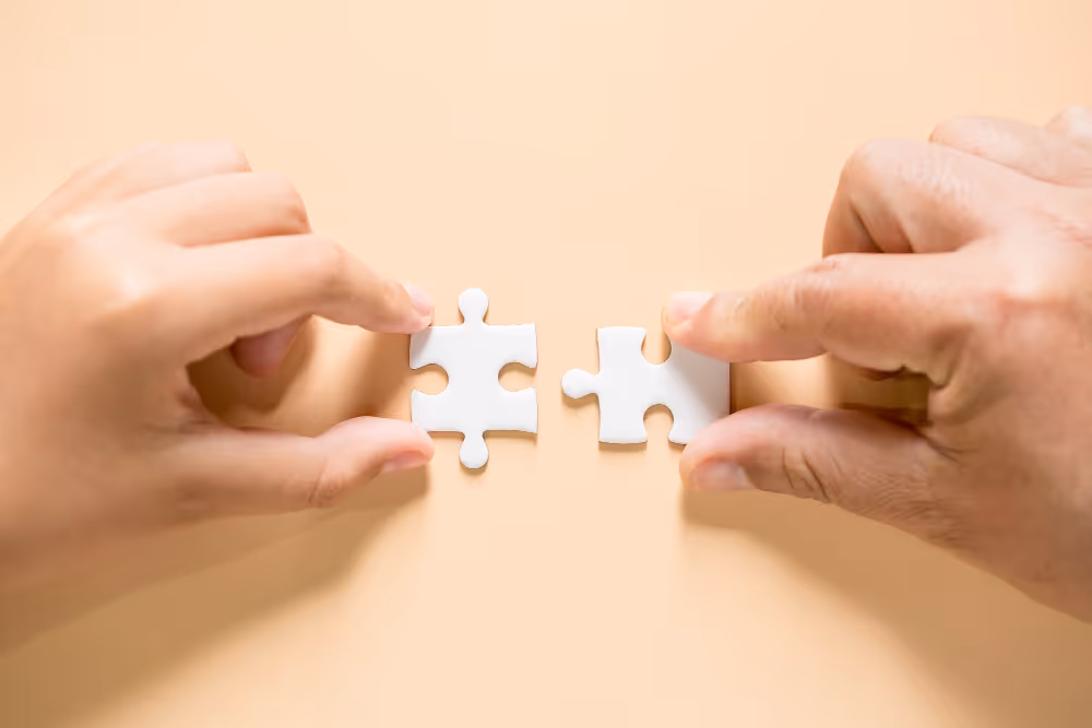 Connecting two white puzzle piece