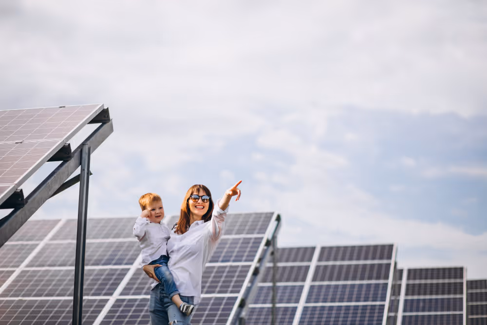 Mother and child on the solar farm