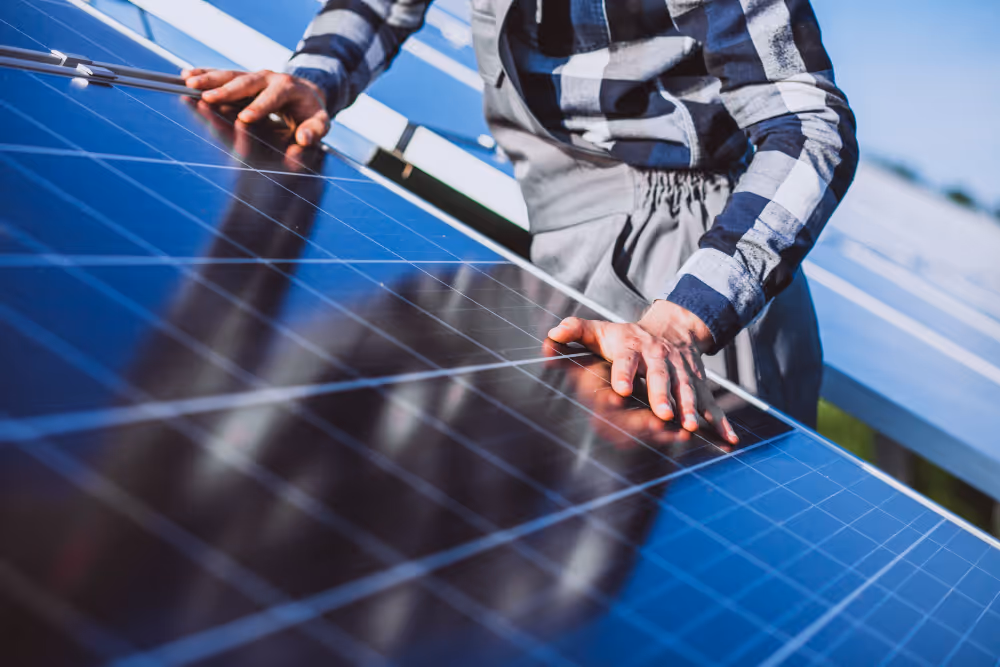 Technician engineer checks the maintenance of the solar cell panels.