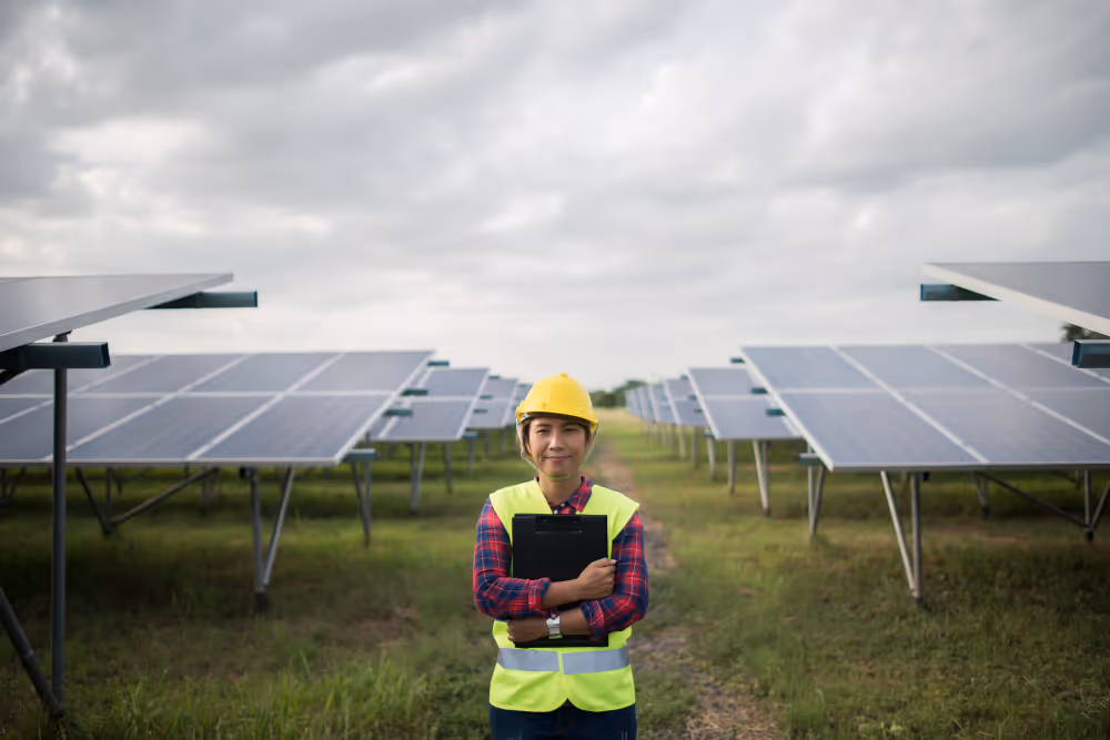A woman technician at a solar farm