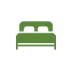 Green icon of a bed with a headboard and pillow, symbolizing a bedroom or sleep.