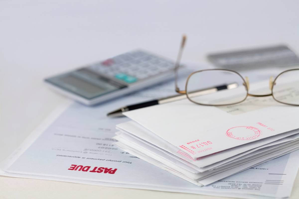 debt collection letters with red stamp that reads past due