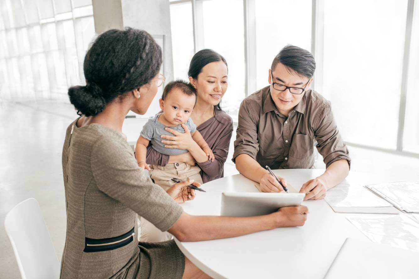 family creating a will with lawyer assistance