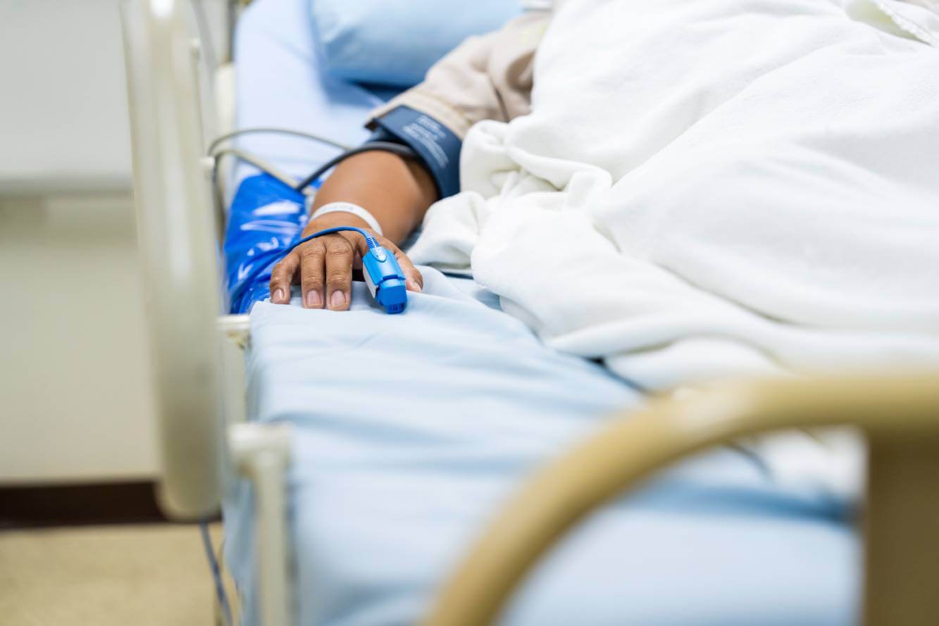 patient in a hospital bed