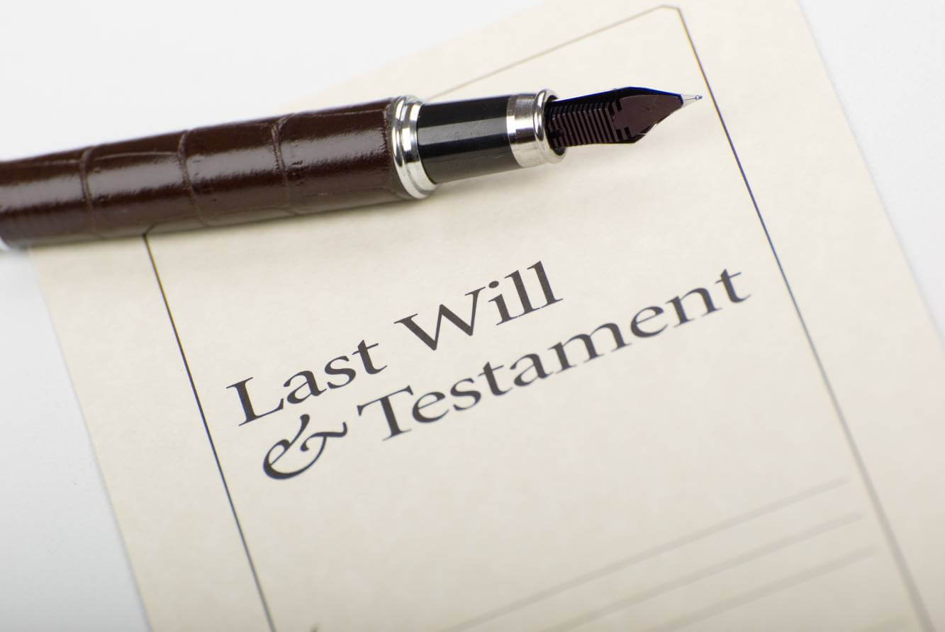 Last Will and Testament document and ink pen