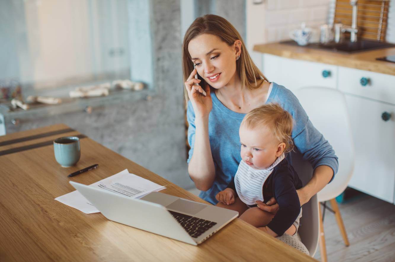 young mother talking on the phone to her LegalShield provider lawyer about her last will and testament
