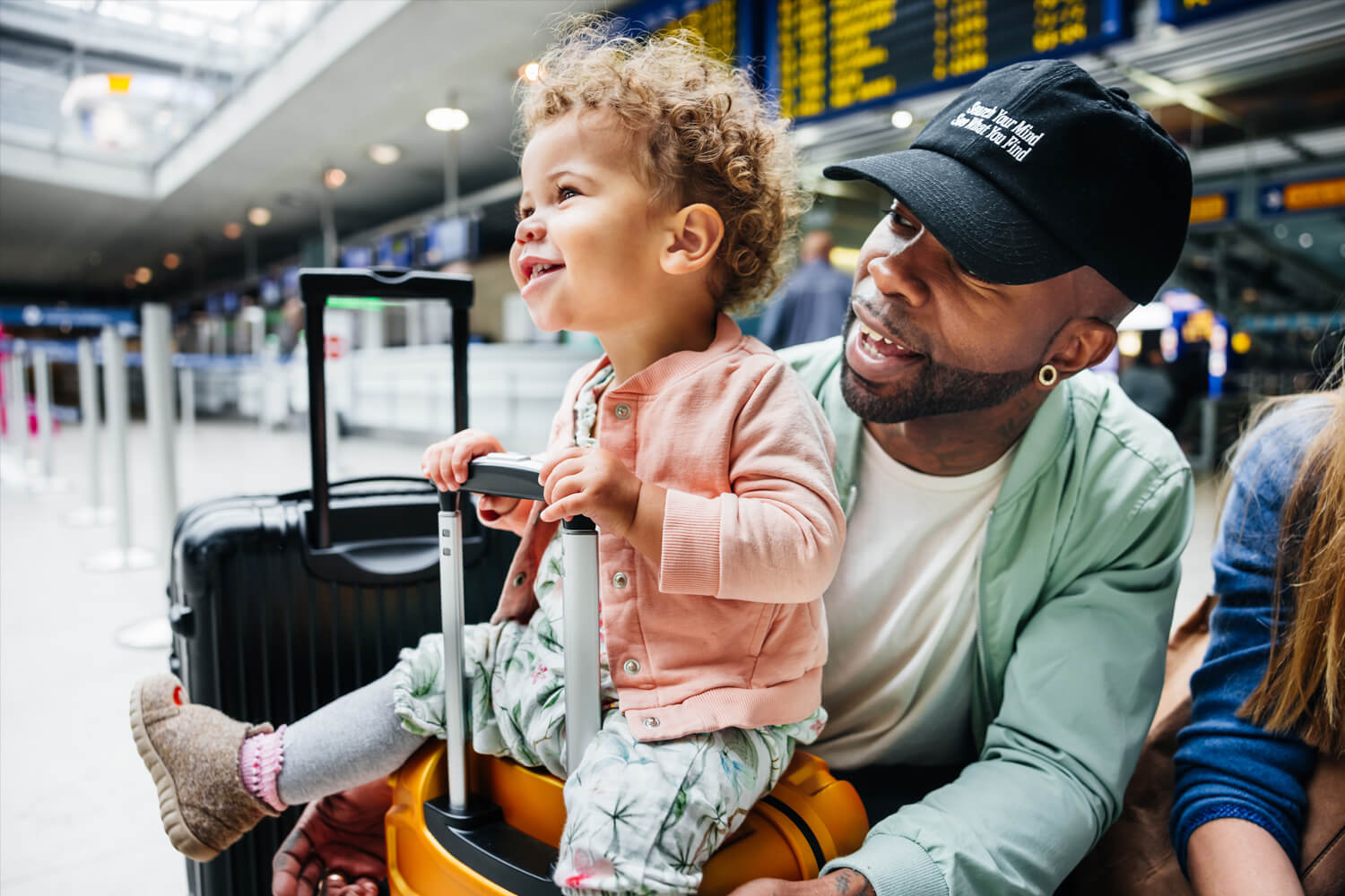 Toddler Sitting On Suitcase
