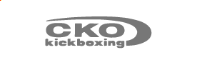 CKO kickboxing logo with stylized gray text and a curved gray swoosh above.