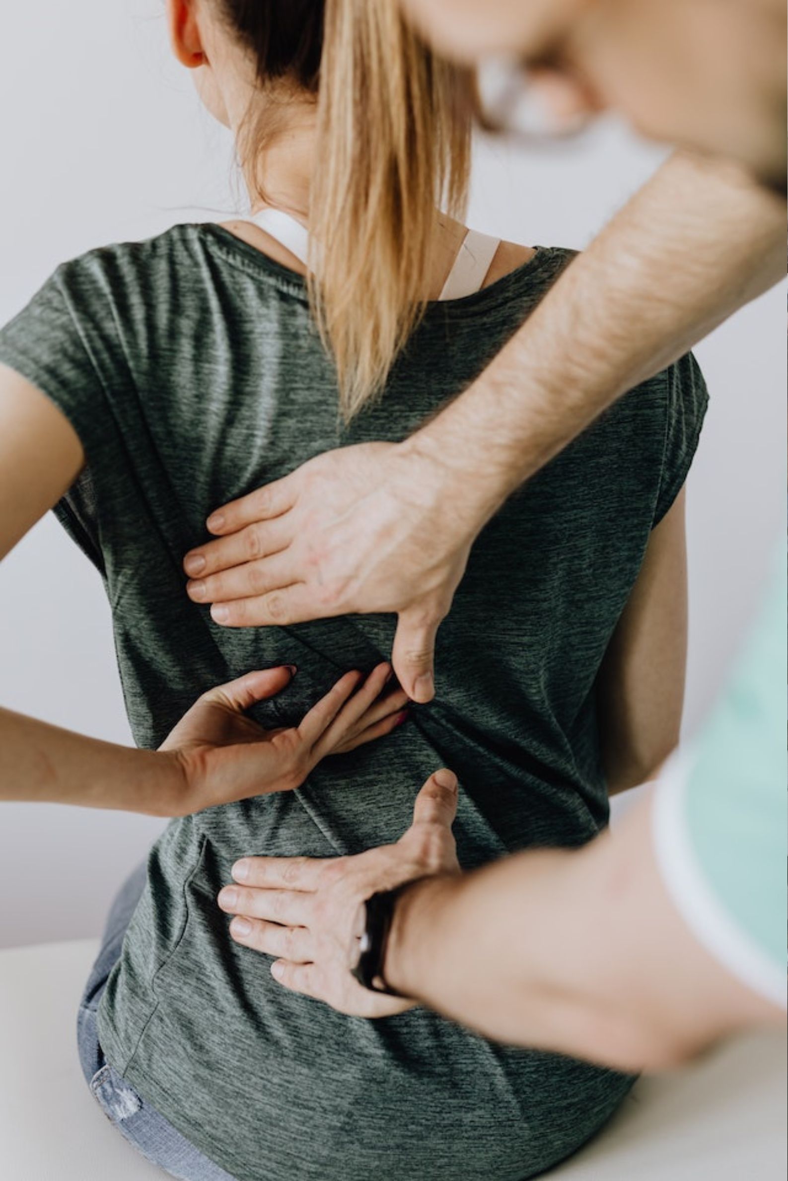 A person getting a back massage.