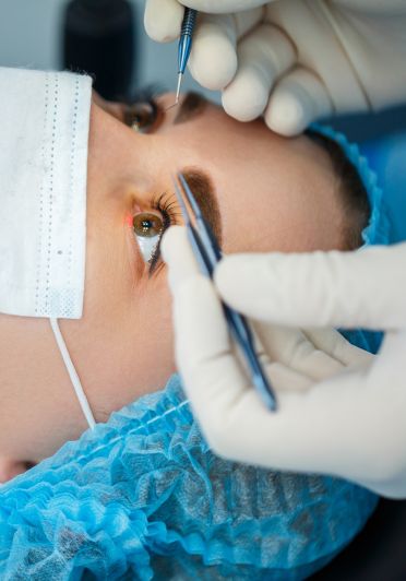 A person is getting their eyes examined.