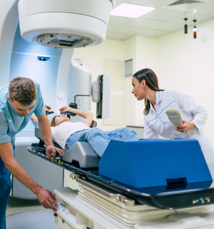 A man is being examined by a doctor in a hospital.