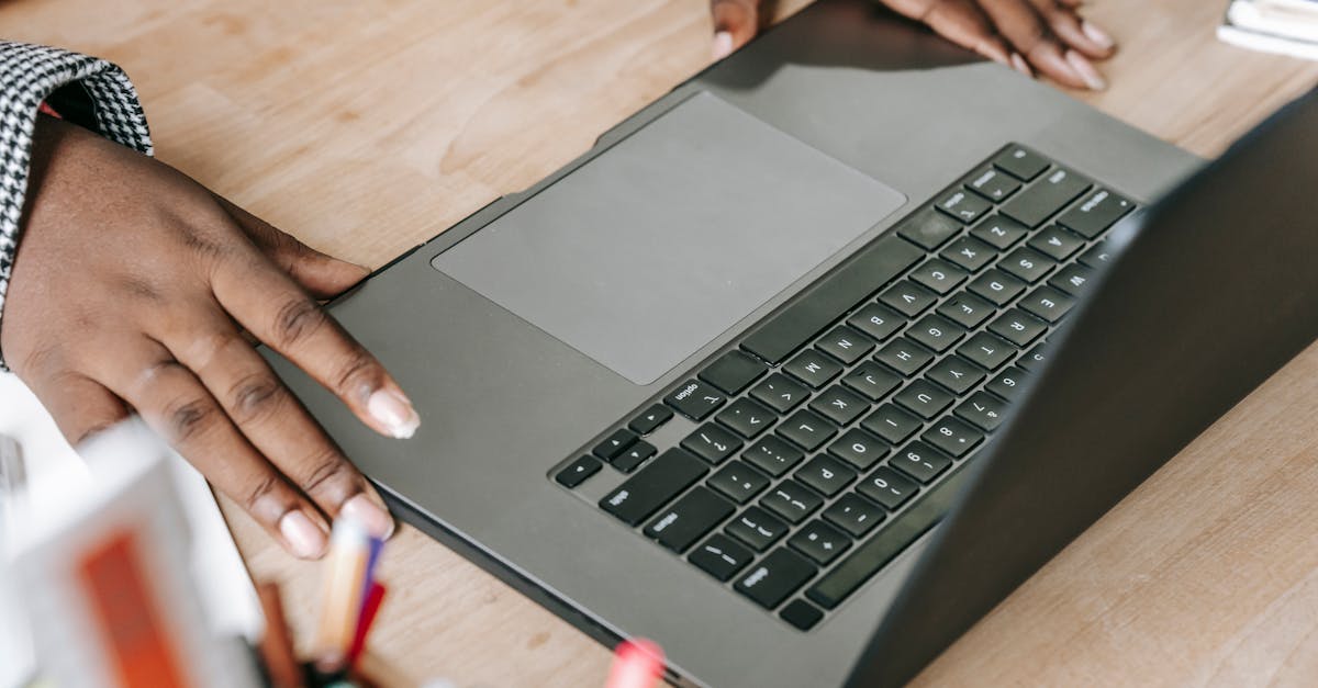 laptop and hand