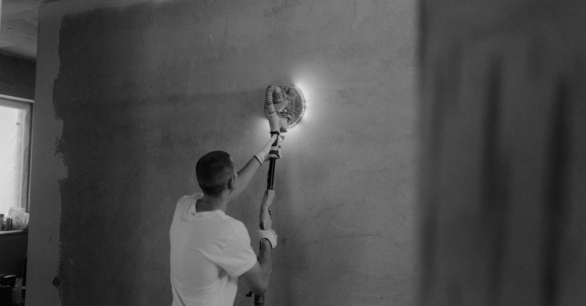 worker on wall